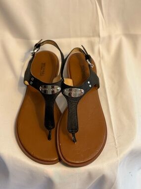 Michael Kors Black and Brown T-Strap Sandals with Logo Plaque